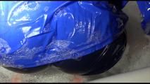 Sonja taking a bath and ties and gagges herself wearing a shiny nylon rainwear combination (Video)