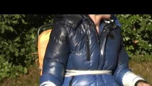 Watch 3 Archive Videos with Julia enjoying Bondage in shiny nylon Downwear.