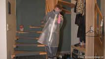Miss Lara in nylon rain suit and transparent rain gear is bound and gagged