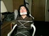 25 YEAR OLD ASIAN MAI-LING IS MOUTH STUFFED, CLEAVE GAGGED, HANDGAGGED, OTM GAGGED, TAPE GAGGED & TIGHTLY TIED TO A CHAIR  (D47-15)