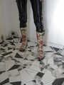 Herrin Nycky im schwarzen Catsuit