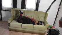 Jasmin hogtied on couch 2/2