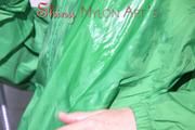 Sonja oiling and rinsing herself in the shower wearing a supersexy green shiny nylon shorts and rain jacket (Pics)