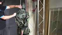Ms Ungeniert tied and gagged in shiny nylon Rainwear 