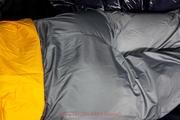 Samanthy bound and gagged in shiny nylon rainwear