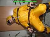 Get 548 Pictures with Jill tied and gagged in shiny nylon rainwear from 2005-2008!