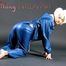 Blonde angel posing in a studio wearing sexy Blue AGU shiny nylon rainwear (Pics)