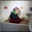 Mara sitting in her bathtub wearing a sexy shiny nylon shorts and a rain jacket while bounding herself (Video)