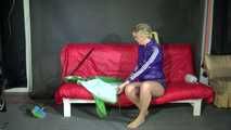 Watching sexy Pia wearing a supersexy shiny nylon shorts and rain jacket cleaning the studio (Video)