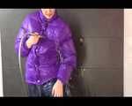 Get an Archive Video with Mara enjoying a shower with her shiny nylon downjacket