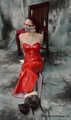Bound in red PVC dress