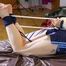 Mara tied and gagged on bed with ropes and a cloth wearing hot shiny nylon shorts and rain jacket (Pics)
