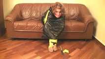 [From archive] Stella - taped sitting with yellow duct tape and packed into trash bag (video)