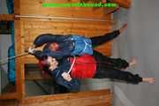 Get 277 Pictures with Michelle and Jill tied and gagged in shiny nylon rainwear from 2005-2008!