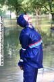 Stella bound outdoor in a blue rainsuit