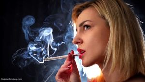 Many many nose exhales with cork cigarette