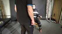 Alice taped to a Chair and tapegagged in shiny nylon Downjacket
