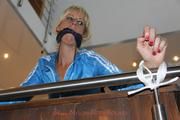 Pia tied and gagged in shiny nylon clothes