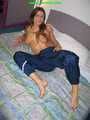 156 pictures of Katharina in shiny nylon rainwear ffrom the years 2005 to 2008!