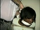 BLACK BANK TELLER IS MOUTH STUFFED, CLEAVE GAGGED & ROPE TIED TO CHAIR  (D46-2)
