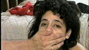 18 Yr OLD LATINA ZARR IS GAGGED WITH SWEATY STINKY NYLONS, TIED WITH LEATHER BELTS, CLEAVE GAGGED, BAREFOOT, BALL-TIED & HANDGAGGED (D54-8)