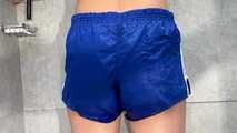 Myxxxy wetting her shiny nylon Shorts