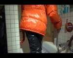 SEXY SANDRA wearing an special orange down jacket and a black down pants during taking a bath playing with water and the downwear (Video)