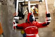 Katharina tied and gagged in shiny nylon rainwear
