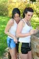 Jill and her friend having fun together outdoor both wearing shiny nylon shorts and a top (Pics)