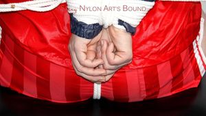 Jill tied and gagged in shiny nylon shorts