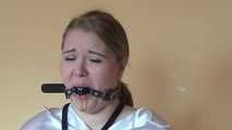 Sandra chairtied and drooling 2/2
