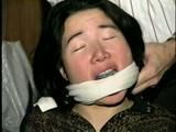 25 YEAR OLD ASIAN MAI-LING IS MOUTH STUFFED, CLEAVE GAGGED, HANDGAGGED, OTM GAGGED, TAPE GAGGED & TIGHTLY TIED TO A CHAIR  (D47-15)