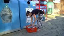 barefoot at the garbage