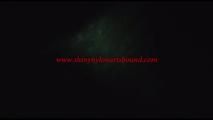 Jill tied, gagged and hooded on a cellar floor wearing a shiny green rain pants and a shiny black down jacket (Video)
