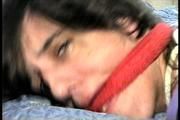 26 Yr OLD K-MART CLERK GETS MOUTH STUFFED, CLEAVE GAGGED, HOG-TIED ON THE BED WEARING NYLON STOCKINGS AND HEELS (D69-13)