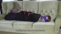Vanessa hogtie on couch 2/2