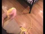 Alice Lee - Dress-wearing beauty gets tied to a table and escapes (video)