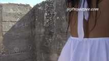 016237 Eve Pees On The Castillo Battlements