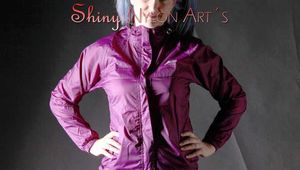 Mara posing infront of the camera for you wearing supersexy purple rainwear and rain boots (Pics)