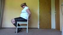 Cuffed on a chair 002
