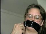 School Teacher Naked, Wrap Tied & Gagged With Black Electrical Tape (D23-10)