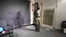 Ms Ungeniert tied and gagged in shiny nylon Rainwear 