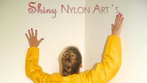 Leonie wearing a super sexy yellow rainwear combination posing outdoor (Pics)
