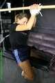 Watch Sandra bound and gagged wearing her shiny nylon Shorts riding a wooden silky Pony ending up Shorts hooded