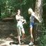 An archive girl tied and gagged on a tree by Jill both wearing shiny nylon shorts (Video)