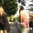 023075 Ewa Has To Avoid Some Visitors As She Pees In The Hotel Gardens