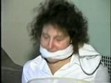 24 YEAR OLD FEISTY HOUSEWIFE CHAIR TIED, BALL-TIED, MOUTH STUFFED & CLEAVE GAGGED (D36-7)