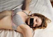 Barefoot tapegagged Grace in grey lace polka dot bra and panties, tied on the bed with her hands and legs wide-spread, wiggles helplessly