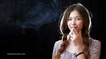 Really sexy babe Irina showing her smoking skills with a 120mm Cigaronne