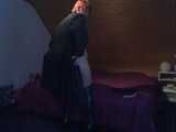 In long patent-leather boots ...